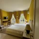 07-villa-aetos-bedroom-curtains-and-headboard